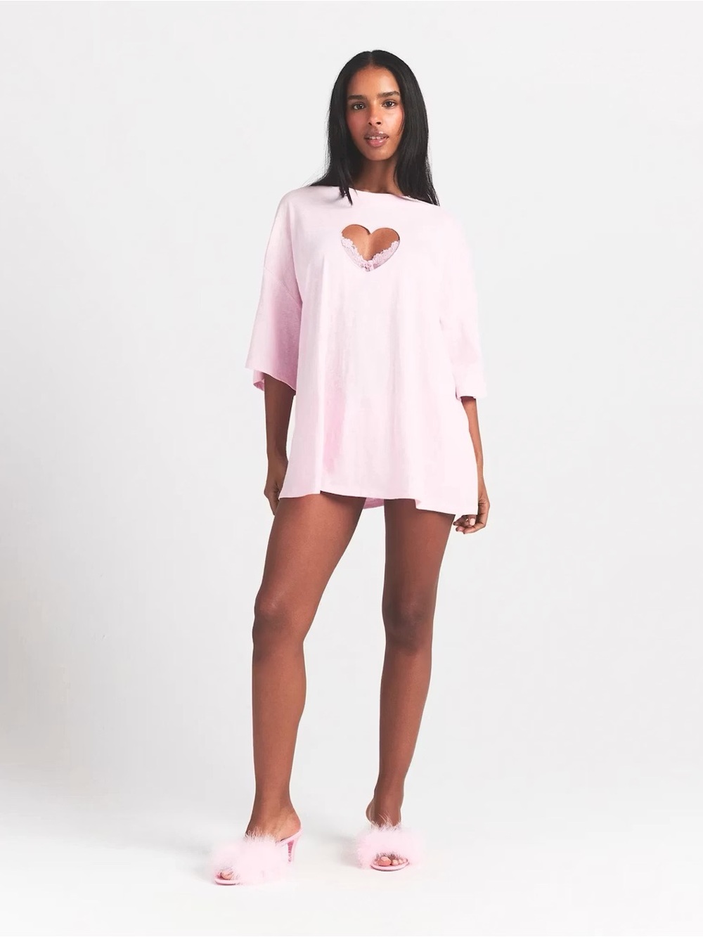 Skims worn in jersey heart oversized T-shirt and micro short
